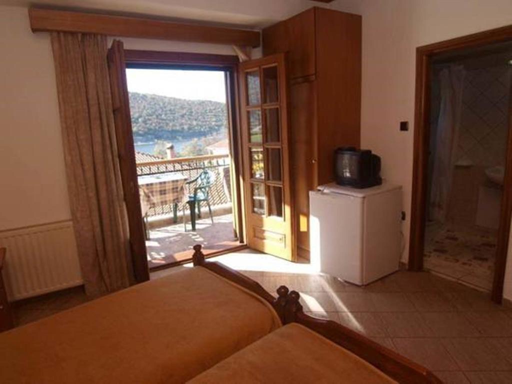 Arhontiko Hotel Psarádes Quarto foto